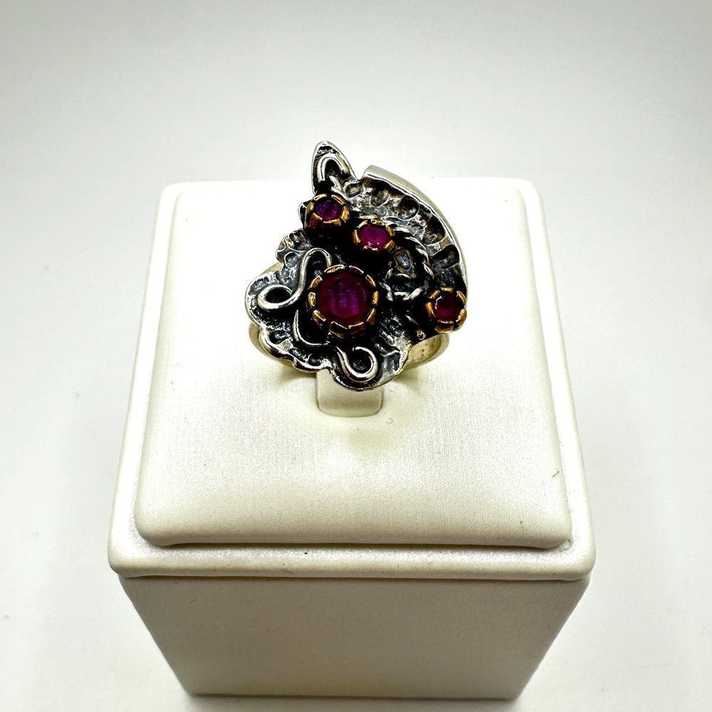 One-of-a-kind, round cut Rubies and Sterling‎ silver two tone custom ring!